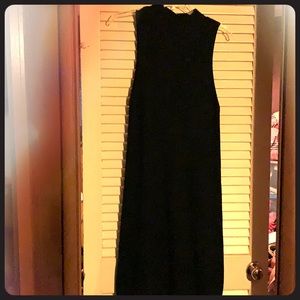 Never worn with the tags, black sweater dress.